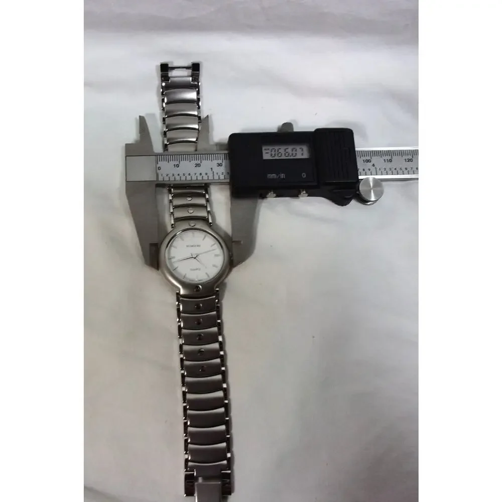 LOT OF TWO MEN'S WATCHES ONE RUMOURS QUARTZ ONE TIMEX INDIGLO-BOTH WORKING